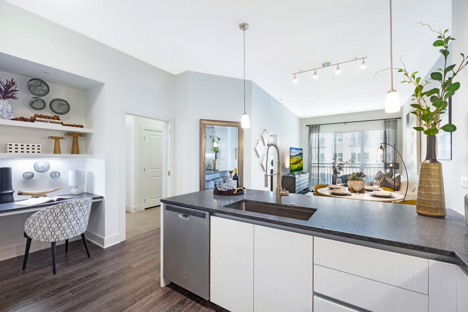 An open - concept masterpiece with expansive natural light.