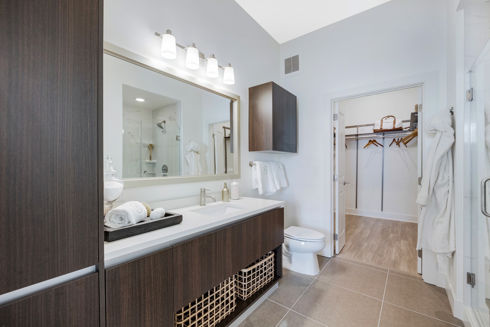 Take advantage of ample storage space in your spa - inspired bathroom.