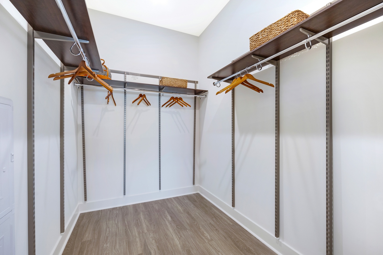 Enjoy expansive walk - in closets with built - in organizational systems.