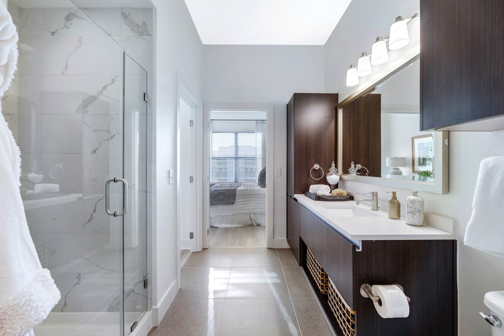 Enjoy sleek , modern finishes and stand - up showers.